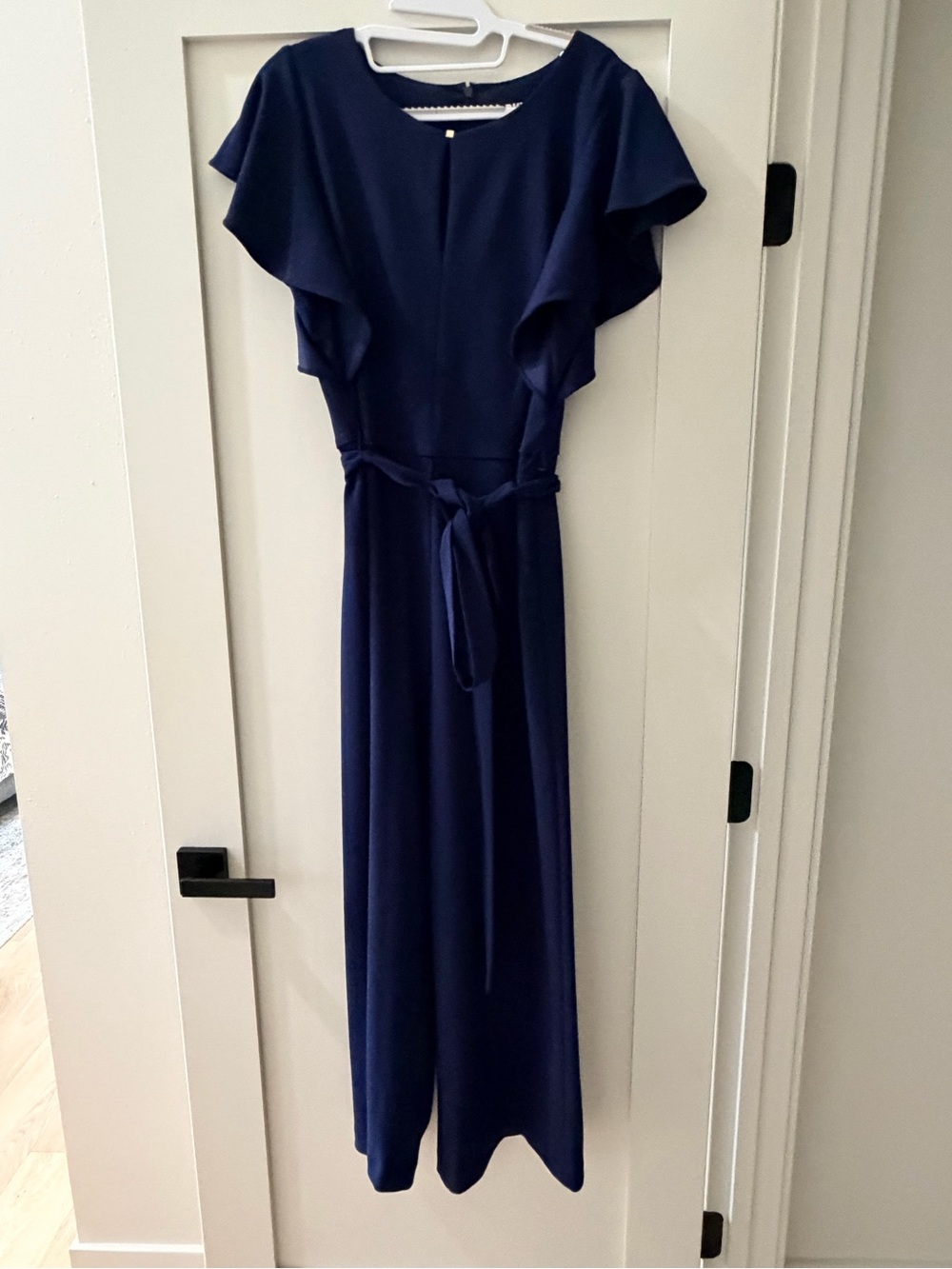 Elegant Navy Flutter-Sleeve Jumpsuit with Waist Tie